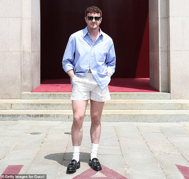 Paul Mescal shows off his muscular thighs in a pair of short-shorts as he joins Venus and Serena Williams at Gucci presentation during Milan Fashion Week