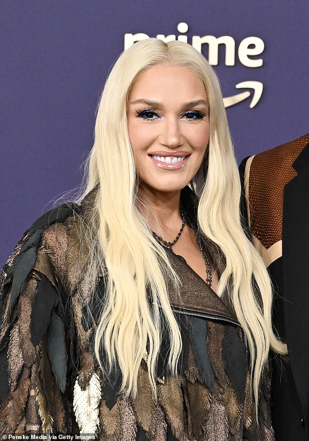 She is Gwen Stefani. The star got her start with the band No Doubt and then married Gavin Rossdale. They split in 2017 and then she fell in love with her The Voice costar Blake Shelton, whom she married in 2021. Seen in May