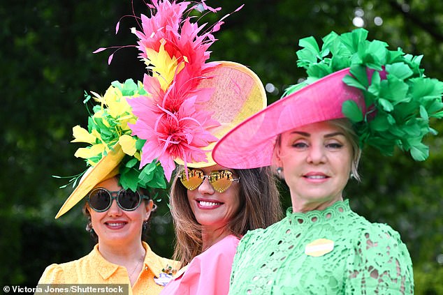 Glamorous racegoers at the second day of Royal Ascot posed for photographs in their bright ensembles