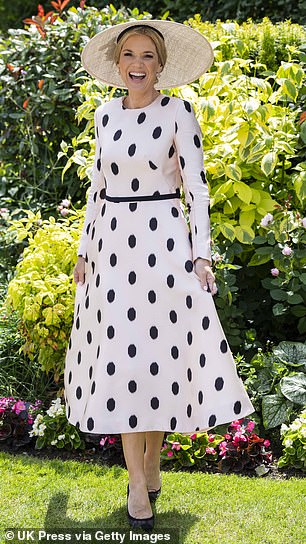 Good Morning Britain presenter Charlotte, 49, looked lovely in a polka dot maxi dress and large hat