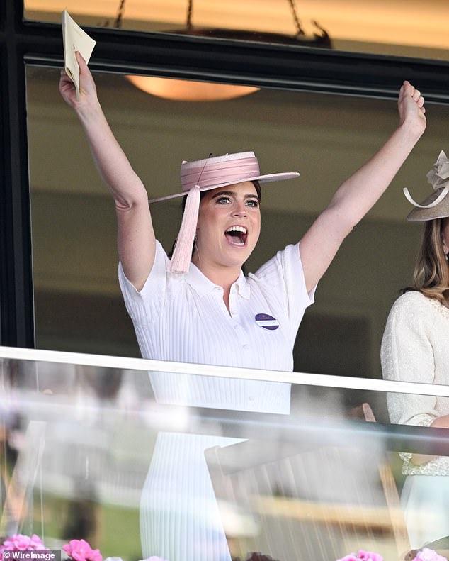 The thrill of the race! Eugenie throws her arms aloft as her horse comes first at Ascot