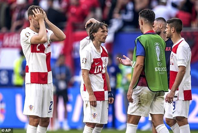 Croatia 2-2 Albania: Luka Modric and Co suffer ANOTHER Euro 2024 blow as they concede stoppage time equaliser to leave knockout hopes hanging by a thread