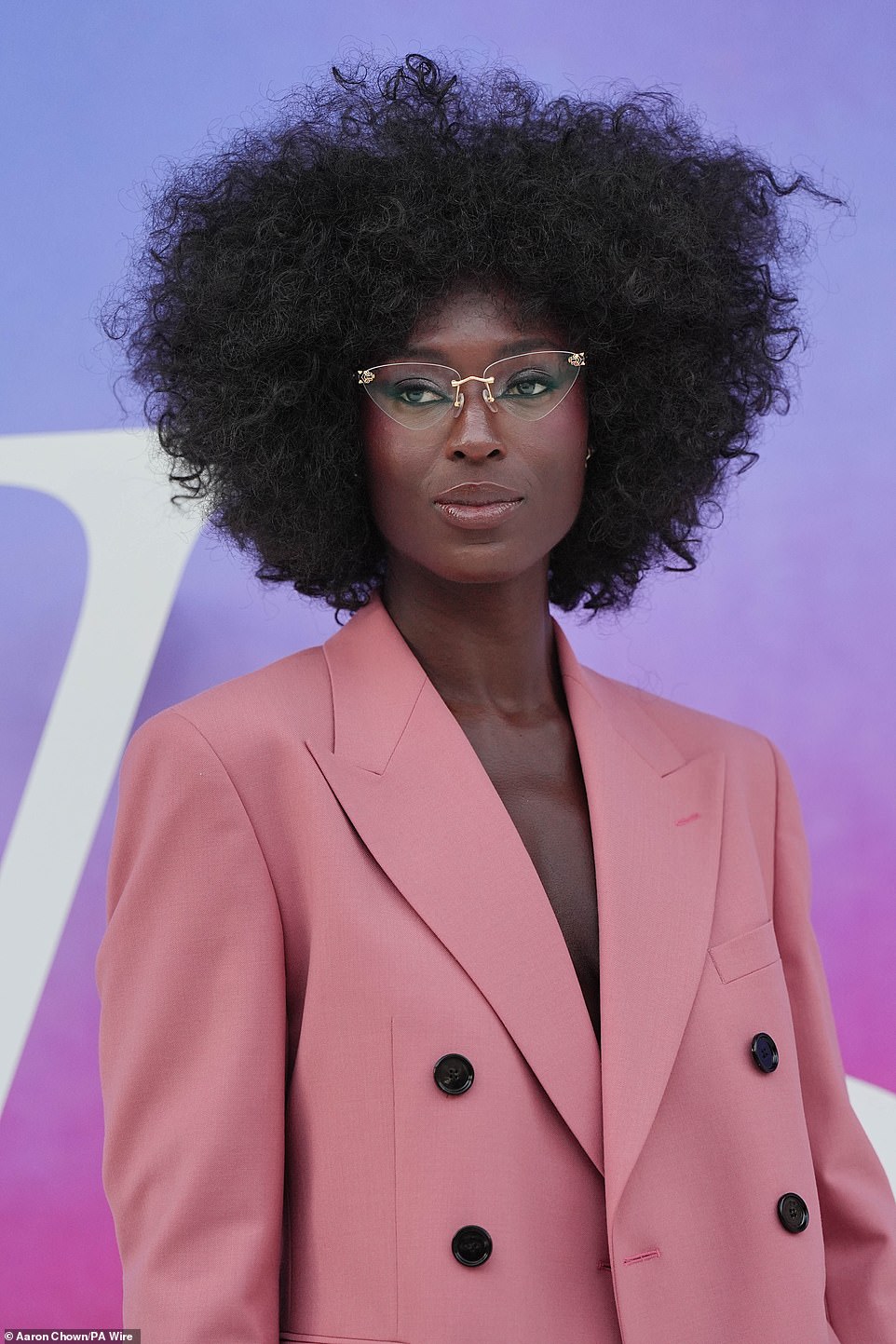 She wore her hair in a natural afro and sported a pair of quirky glasses