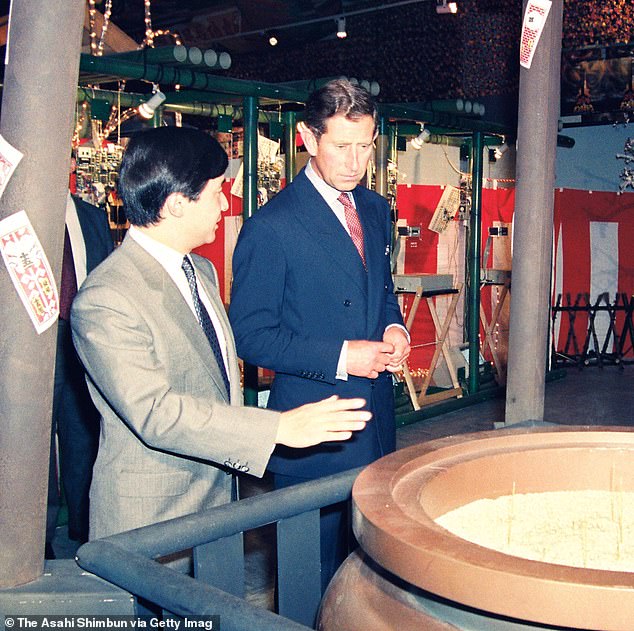 The then Japanese Crown Prince Naruhito and Prince Charles viewing an exhibition after the opening ceremony of the Japan Festival 1991 at the Victoria and Albert Museum