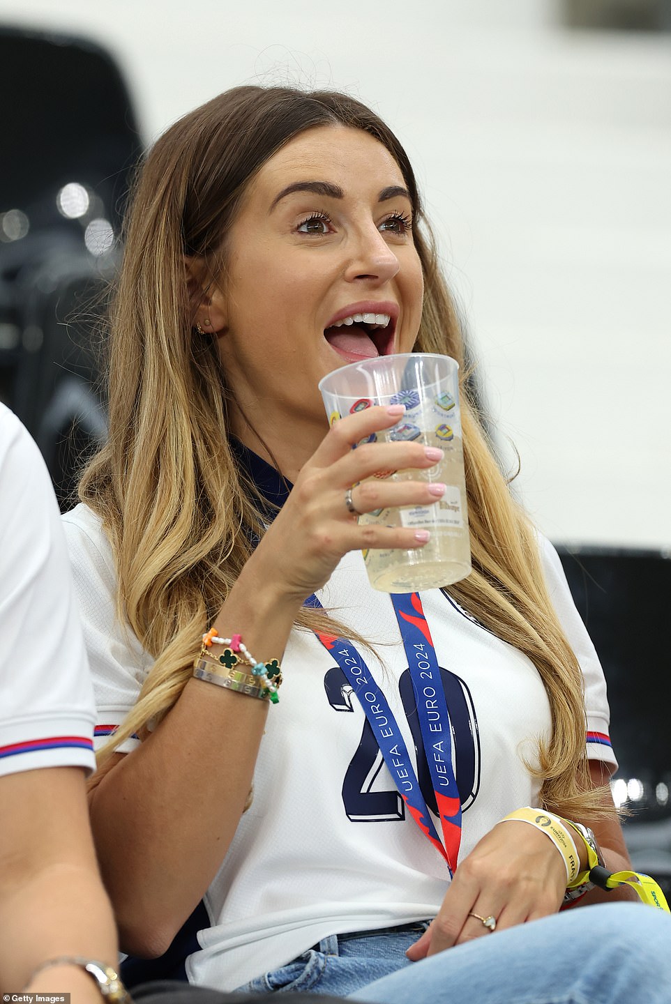 WAGS Dani Dyer (pictured) and Tolami Benson got ready to cheer on their boyfriends as they arrived at the stadium in Germany on Thursday