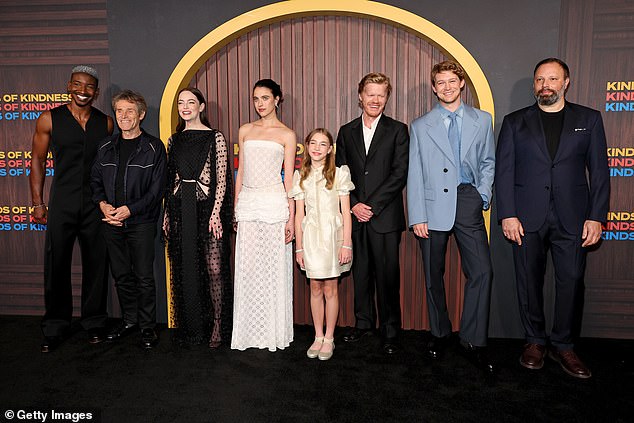 Mamoudou Athie, Willem Dafoe, Emma Stone, Margaret Qualley, Merah Benoit, Jesse Plemons, Joe Alwyn and Yorgos Lanthimos paused for a group photo on the red carpet ahead of the screening