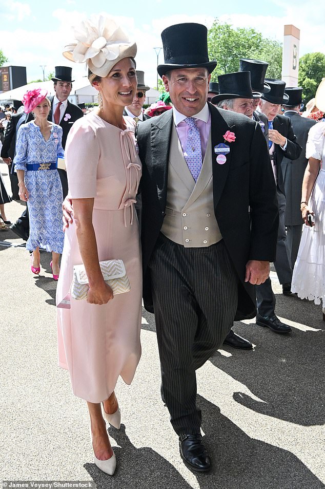 The couple huddled closely together, and packed on the PDA as they enjoyed a day at Royal Ascot