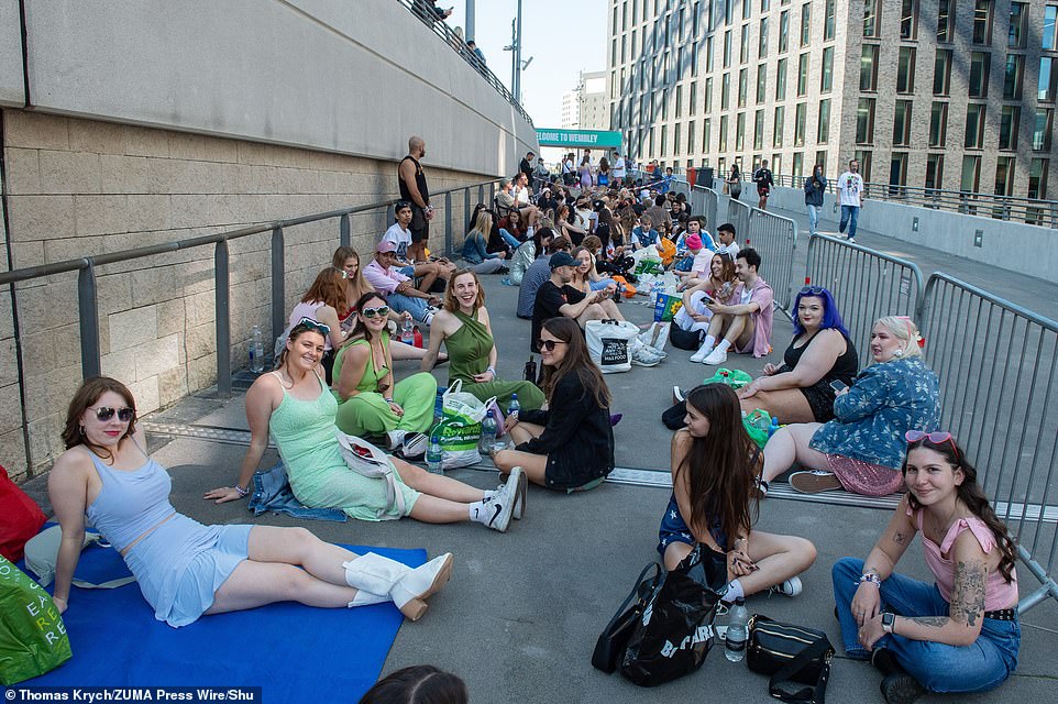 Fans queuing outside Wembley Stadium in London, ahead of Taylor Swift's first London concert