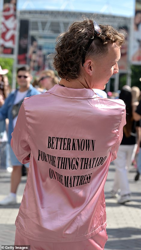 Lyrics on the back of the nightwear read: 'Better known for the things that I do on the mattress' - a reference to the Swift song Better Than Revenge