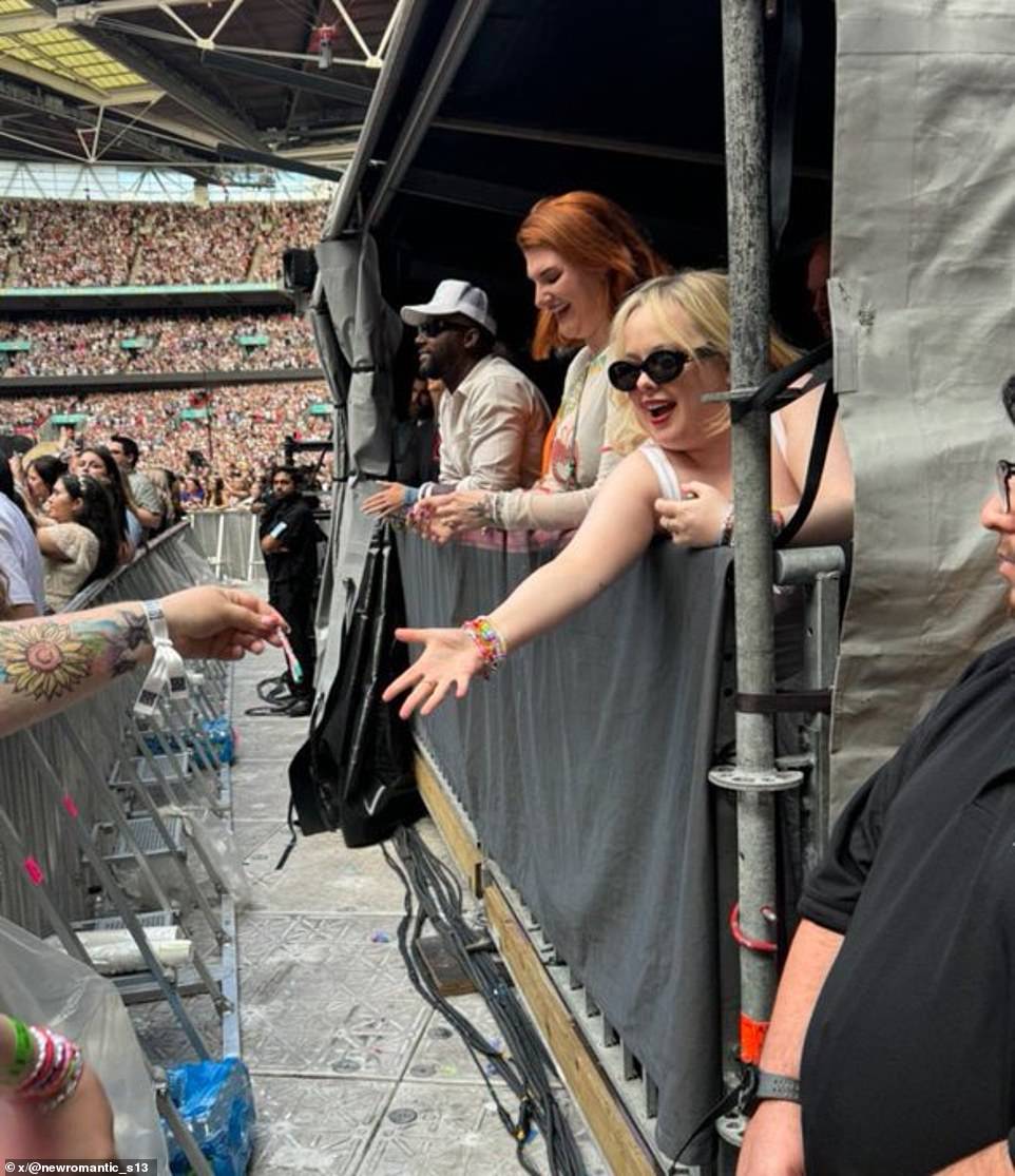 Bridgerton actress Nicola Coughlan trades friendship bracelets with fellow Swifties from the VIP tent