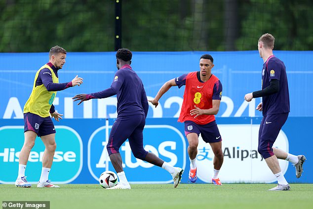Trent Alexander-Arnold (second from right) is likely to lose his place having struggled in midfield