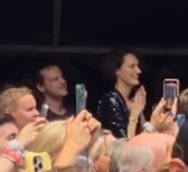 Andrew Scott (left) and Phoebe Waller Bridge (right) watch tonight's show from the VIP tent