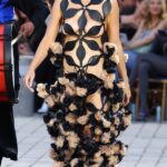 Katy Perry nearly flashes all in a nude geometric cut-out dress as she makes surprise appearance on Vogue World Paris runway