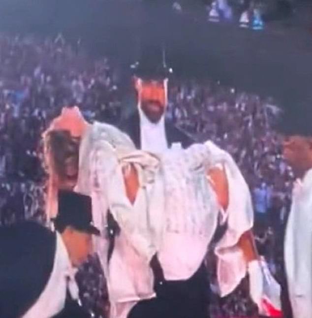 Taylor's NFL beau carried her in front of 89,000 shocked fans