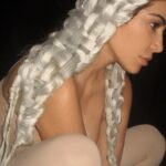 Kim Kardashian rocks sheer nude top with leggings – with her platinum locks in woven-style braids