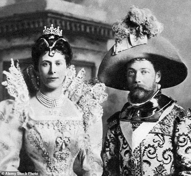 George V and Mary of Teck in fancy dress at the Devonshire House Ball in 1897. Mary was wearing a turquoise brooch under her pearl choker