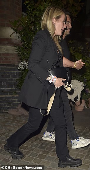 The British singer wore a smart black outfit and matching shoes as she left the Marylebone venue
