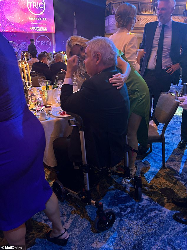 Charlotte Hawkins showed her support for her former Sky News co-host at the party, with the Good Morning Britain star seen hugging Eamonn who was in a wheelchair