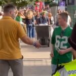 Heartwarming moment Jason Kelce sneaks up and surprises shocked young Eagles fan on way into Taylor Swift show in London