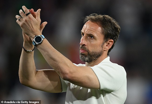 Gareth Southgate has plastic pint cups thrown at him by irate England fans after dire 0-0 draw with Slovenia as Three Lions supporters turn on boss despite winning Euro 2024 group