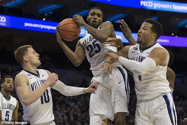 Bridges grabs a rebound in front of Villanova teammates Donte DiVincenzo (left) and Jalen Brunson (right) in 2018. All three will now reunite with the New York Knicks
