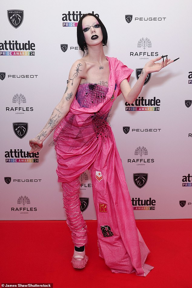 In contrast, Eurovision star Bambie Thug pulled out all the stops in a bright pink jumpsuit, adorned with netting, badges and a draped sash