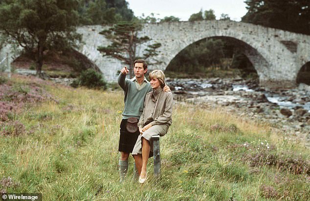 Charles and Diana stand on the banks of the River Dee in the grounds of Balmoral during their honeymoon, August 1981