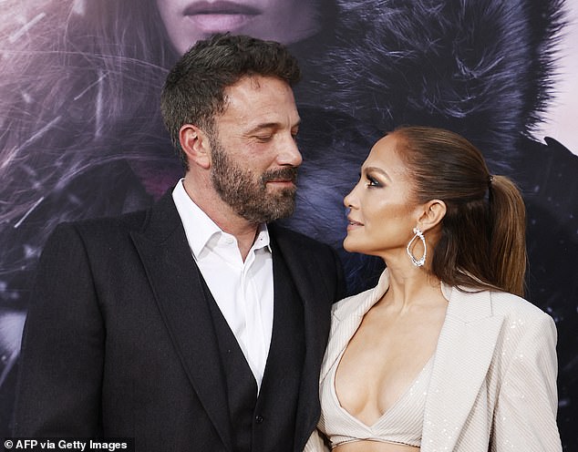 Divorce rumours between Ben and Jennifer Lopez (pictured together in May) intensified this week after she was spotted without a wedding ring.
