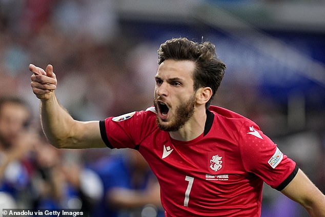 Georgia's shock win over Portugal meant England would be paired with Slovakia in the next round. In the picture: Star player Khvicha Kvaratselia celebrates scoring the first goal on Wednesday night