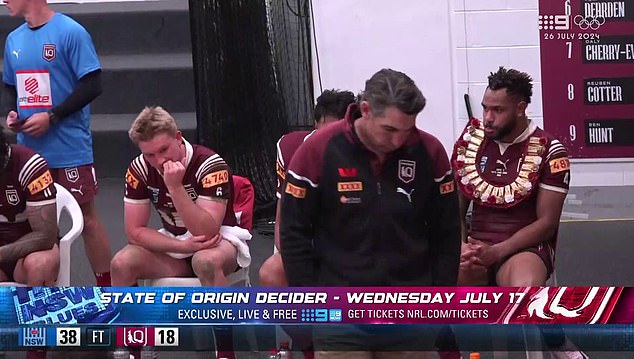 Revealed: Why Queensland star Hamiso Tabuai-Fidow was wearing a VERY flashy decoration as his teammates looked crushed after their big loss to NSW