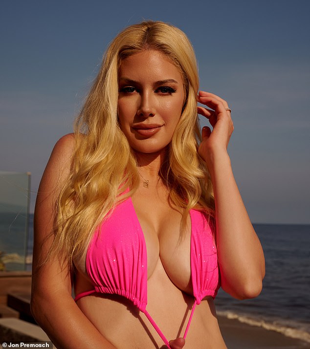 Heidi pulled off her hot pink bikini bra and looked into the camera lens