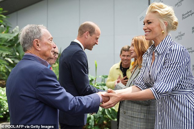 The feisty actress also hit out at Mike Bloomberg, who had mispronounced her name and introduced her as Hannah 'Wanningham' (pictured greeting each other)