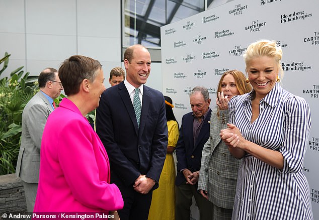 Hannah Waddingham, who wore a striped frock, is seen talking to Prince William today
