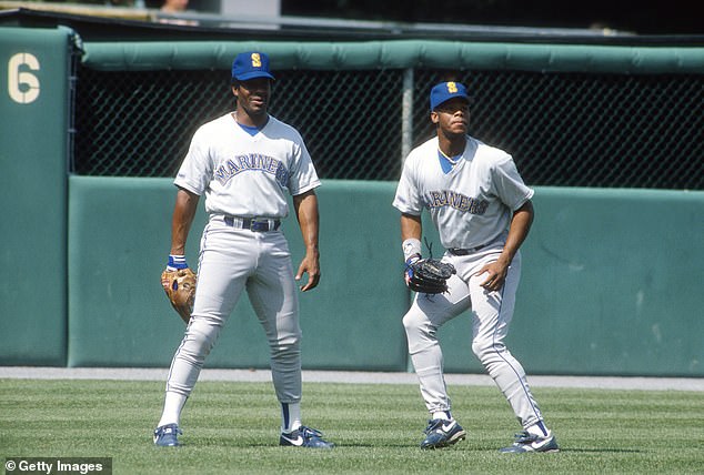 Ken Griffey Jr. (left) playing alongside his son and namesake during the 1990 season