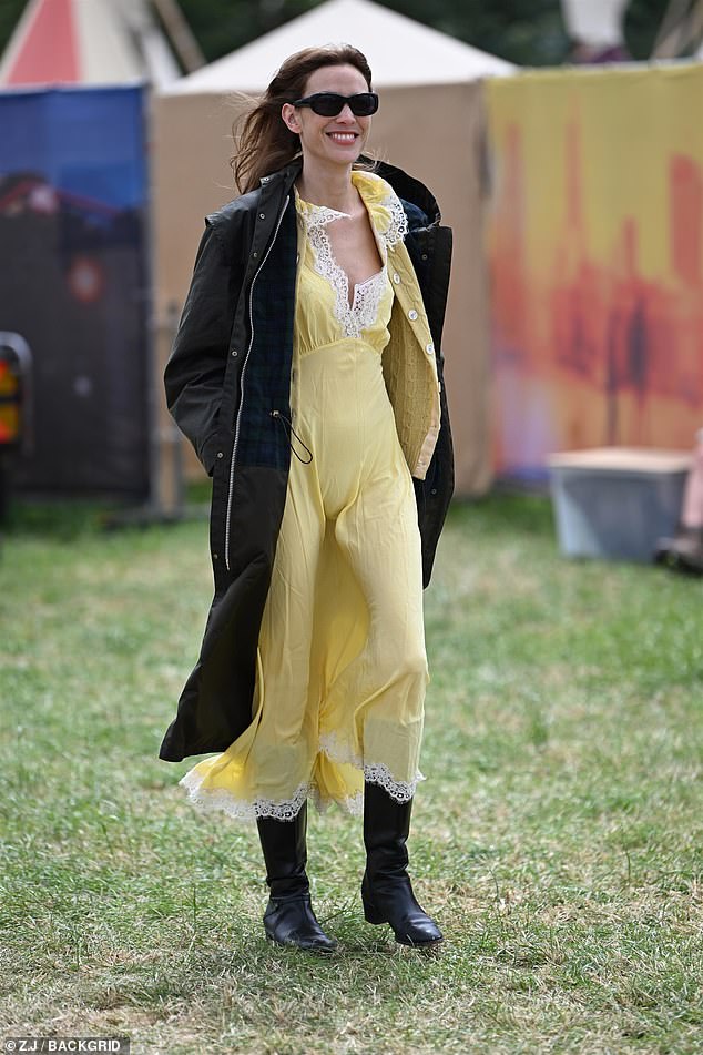 The fashion star teamed her quirkly look with an oversized black jacket and a cosy yellow cardigan as she joined a slew of stars at the annual music event