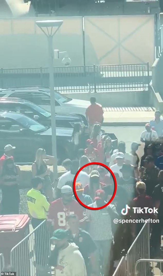 The disguised singer was caught on camera entering the stadium amidst fans