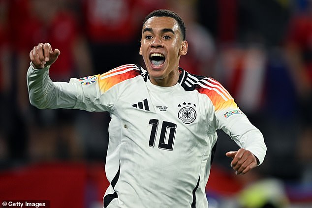 Germany 2-0 Denmark: Hosts survive scare – and a storm – to reach quarter-finals at Euro 2024… as VAR comes to their aid TWICE in quick succession