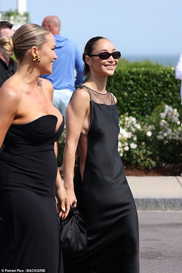 Despite the sunshine, some stylish attendees wore black gowns