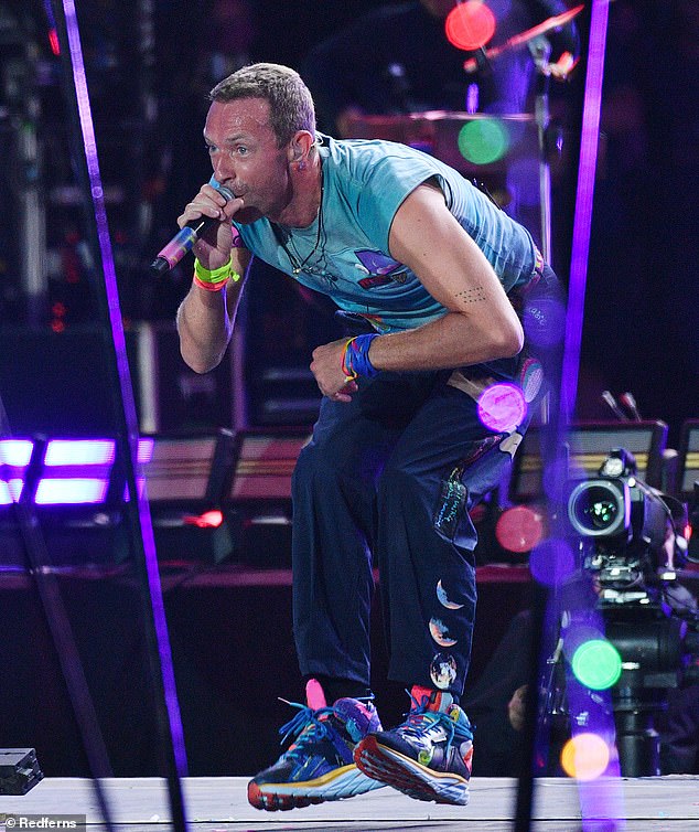 Coldplay made history as they became the first group ever to headline Glastonbury five times on Saturday  (frontman Chris Martin pictured)