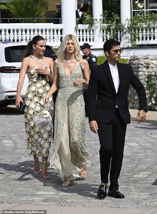 The warm weather didn't stop guests from wearing long dresses