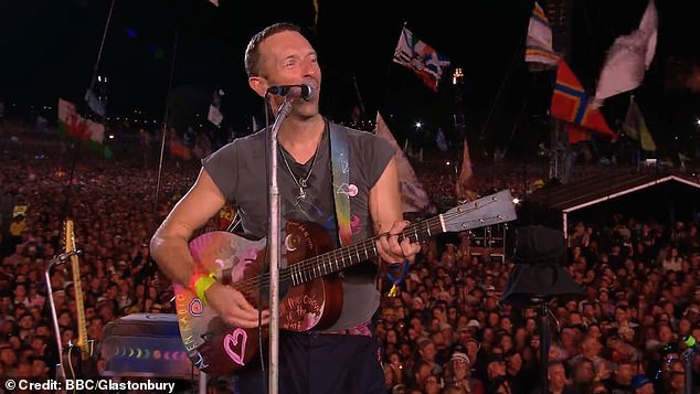 Whoever got knighted wearing shorts! Coldplay’s Chris Martin honours wheelchair-bound Glastonbury founder Sir Michael Eavis, 88, in touching on-stage tribute before inviting Michael J Fox to join him playing guitar on Fix You amid his Parkinson’s battle