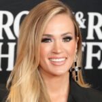 Carrie Underwood says ‘time flies’ as she shares rare photos of youngest son Jake