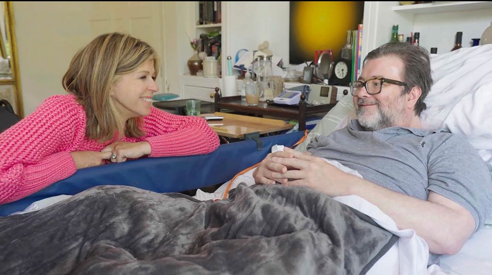Kate Garraway sits and talks to Derek Draper at his bedside