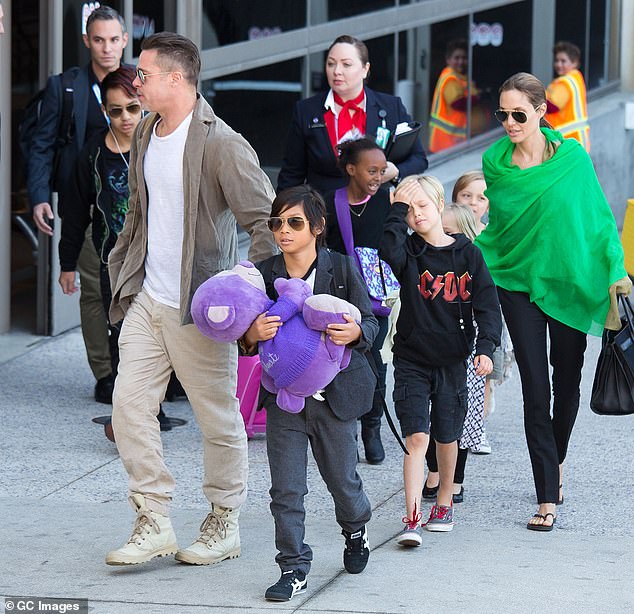 Jolie, who has six children with Pitt - Maddox, 22, Pax, 19, Zahara, 18, Shiloh, 17, and twins Knox and Vivienne, 1 - reportedly contacted Voight in 2010; (pictured in 2014)