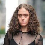 Kamala Harris’ step daughter Ella Emhoff shows off her many tattoos in a chic little black dress