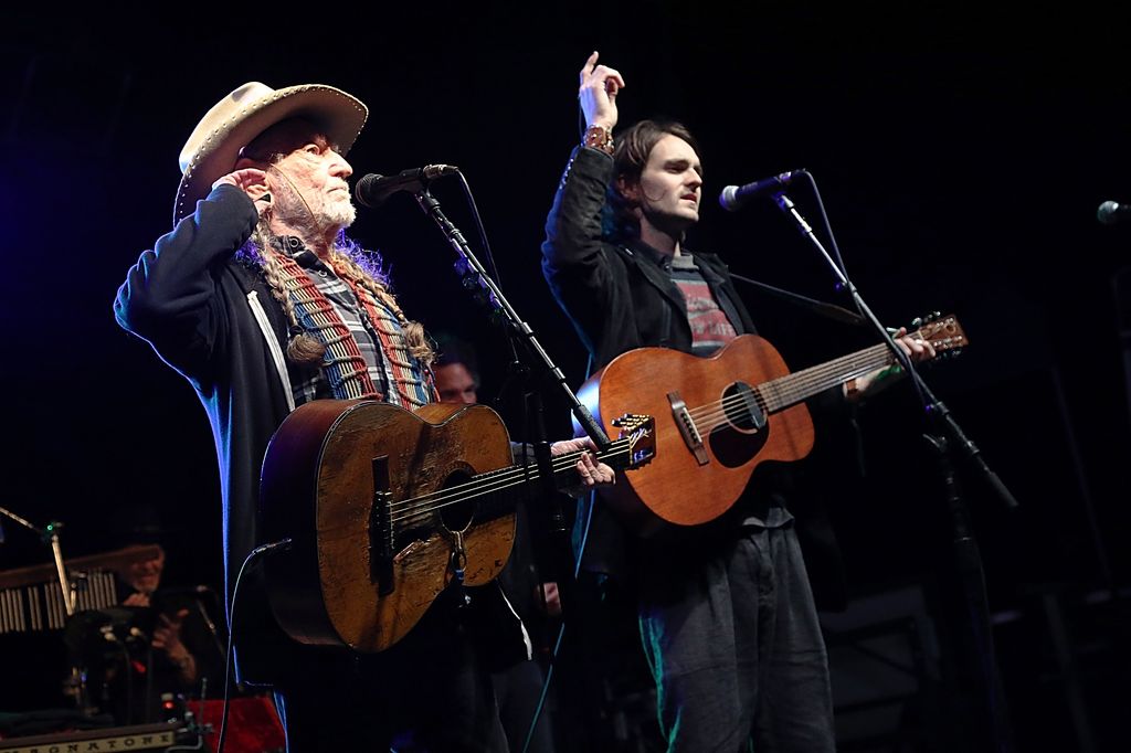 LUCK, TEXAS – MARCH 13: Willie Nelson (L) and Micah Nelson perform in concert during the Luck Banquet in Luck, Texas on March 13, 2019. (Photo by Gary Miller/Getty Images)