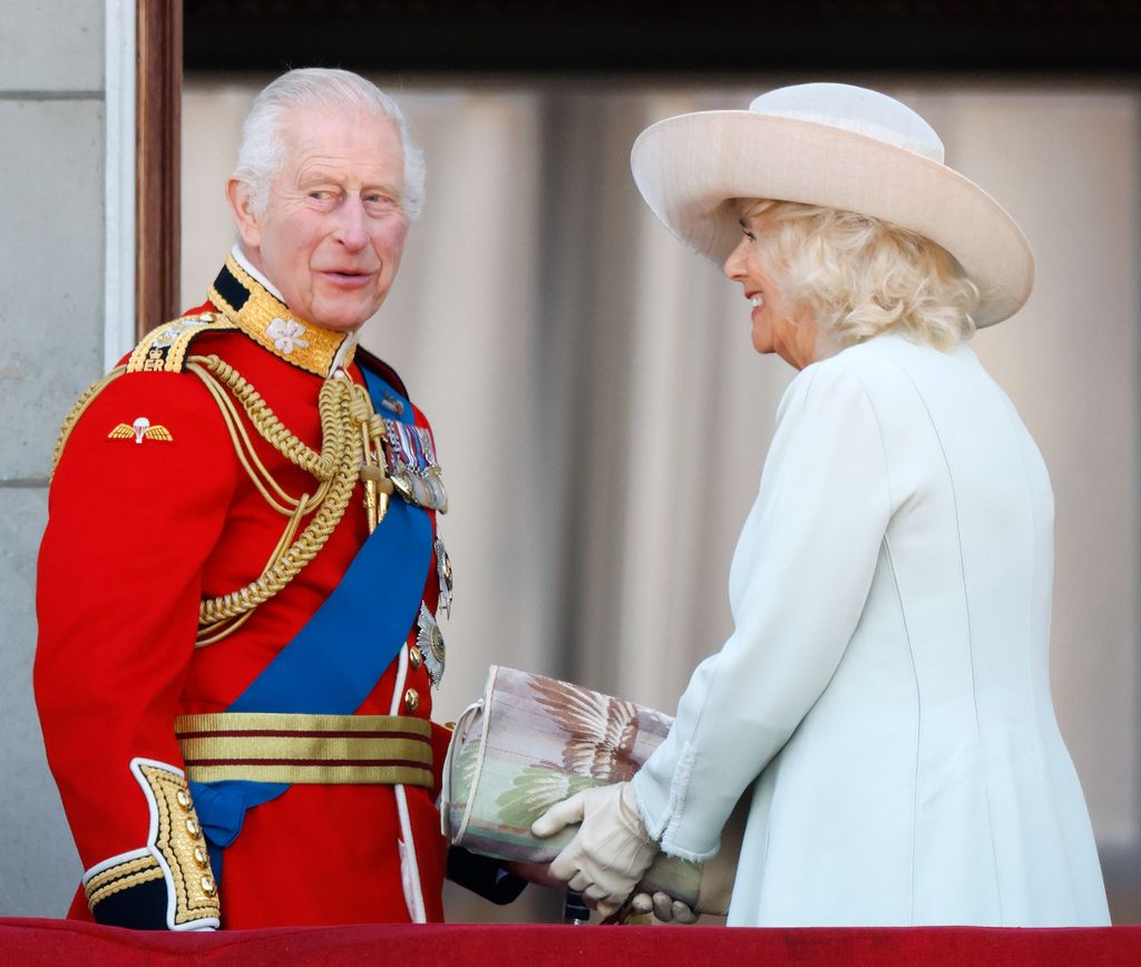 The King and Queen looked very happy after the flypast