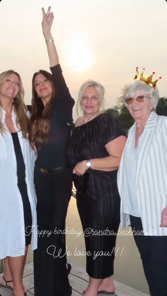 A photo of Victoria Beckham with her sisters-in-law and mother-in-law