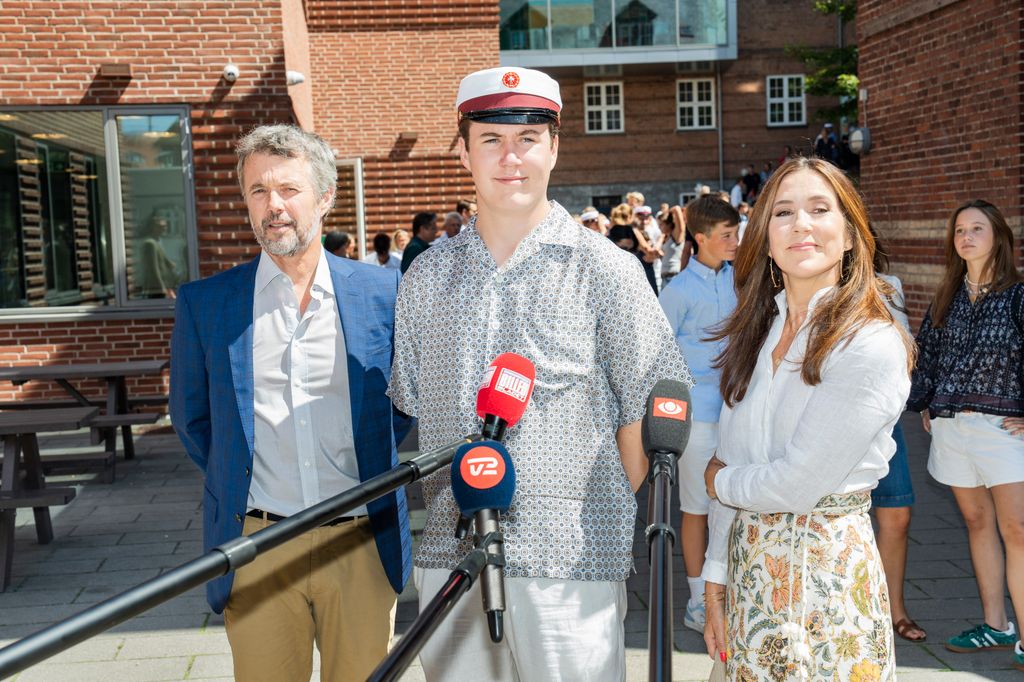 Crown Prince Christian, King Frederick X and Queen Mary meet the press as Crown Prince Christian of Denmark attends his graduation ceremony at Ordrup Gymnasium 