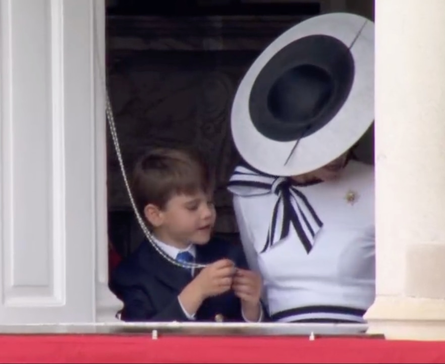 Prince Louis plays with curtain strings